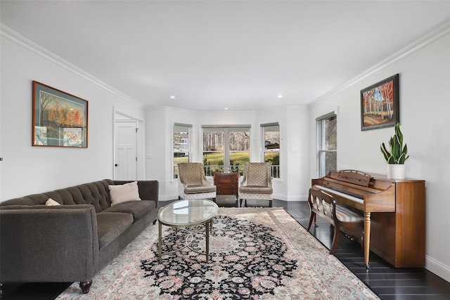 living room with dark wood-style floors, baseboards, ornamental molding, and recessed lighting