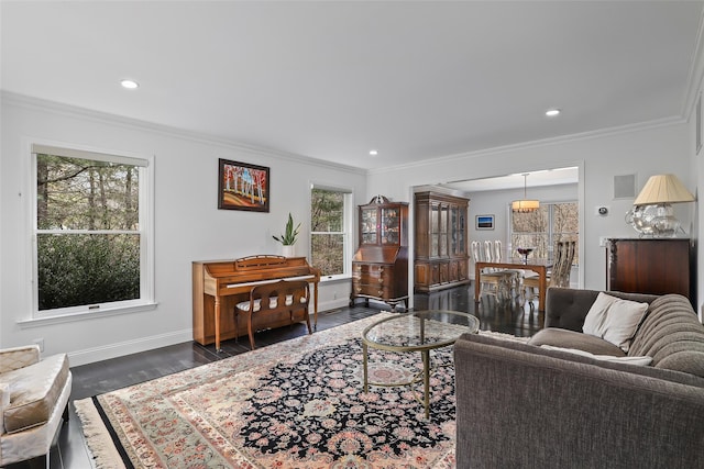 living room with dark wood-style floors, recessed lighting, crown molding, and baseboards