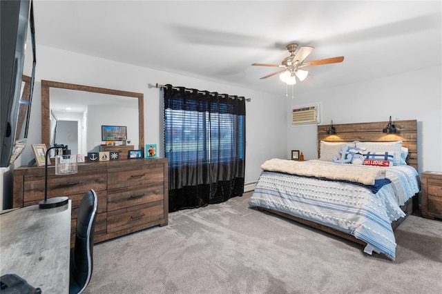 carpeted bedroom with ceiling fan, a baseboard heating unit, and a wall unit AC