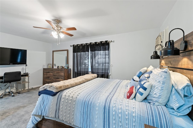 bedroom featuring carpet floors, a ceiling fan, and baseboards