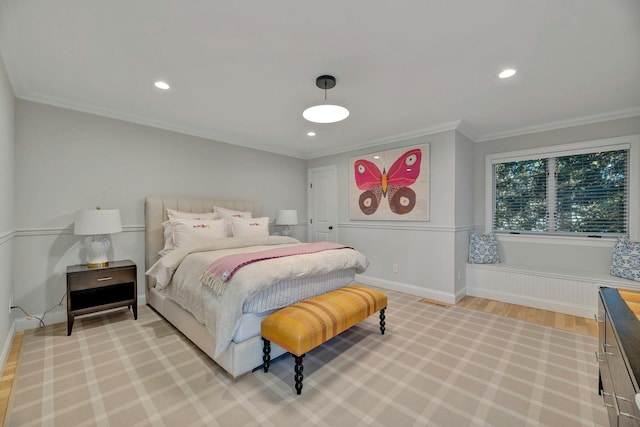 bedroom featuring recessed lighting, light wood-style floors, baseboards, and ornamental molding