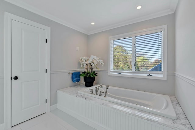 bathroom with tile patterned floors, a garden tub, recessed lighting, and crown molding