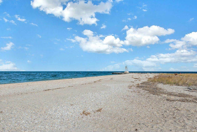 property view of water featuring a view of the beach