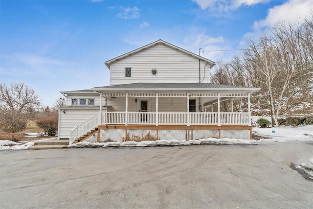 view of front of home featuring covered porch