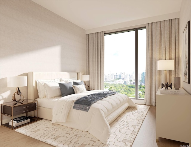 35-32 Leavitt St Unit Ph G, Flushing, NY 11354 - bedroom featuring a view of city and wood finished floors