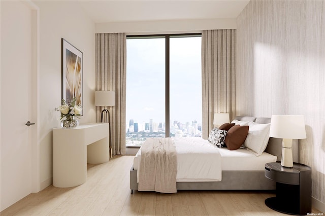 bedroom featuring a city view and wood finished floors