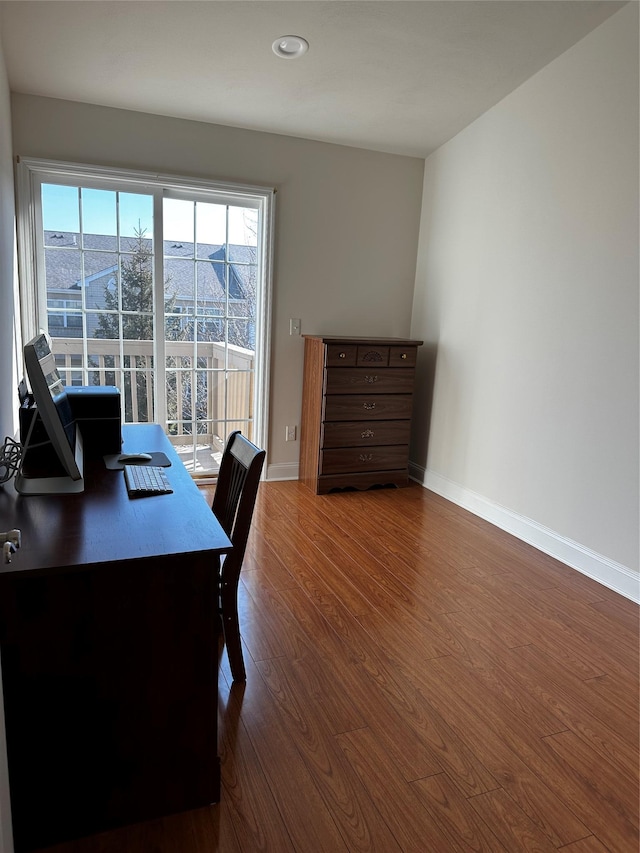 office featuring wood finished floors and baseboards