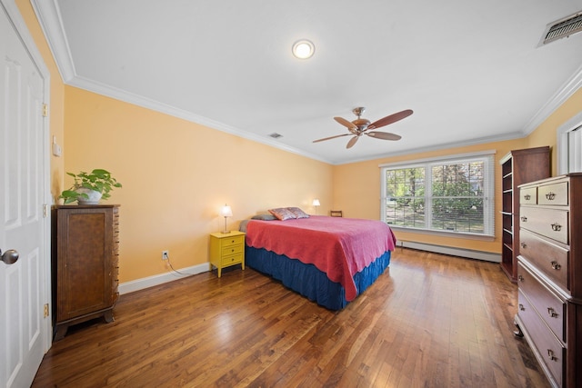 bedroom with visible vents, ornamental molding, hardwood / wood-style floors, baseboards, and a baseboard heating unit