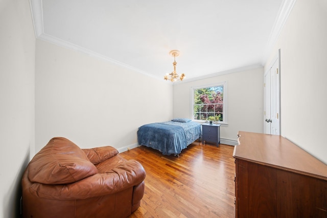 bedroom featuring an inviting chandelier, ornamental molding, baseboards, a baseboard radiator, and light wood-style flooring
