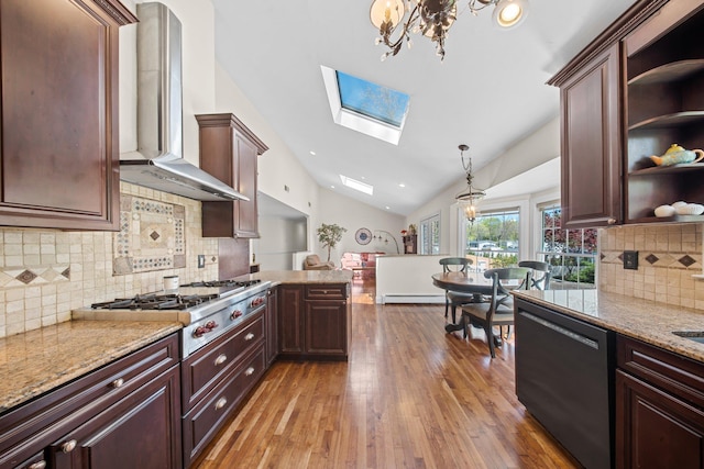 kitchen featuring wall chimney range hood, vaulted ceiling with skylight, open shelves, dishwasher, and stainless steel gas stovetop