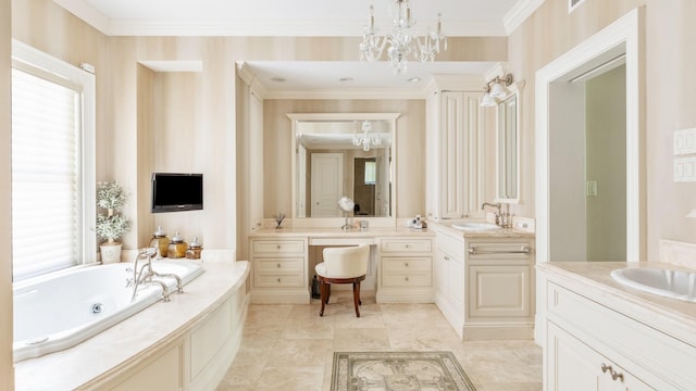 bathroom featuring crown molding, two vanities, a sink, a chandelier, and a jetted tub