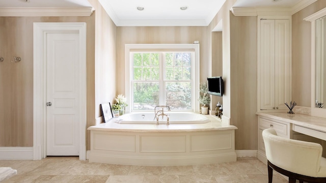 full bathroom with ornamental molding, a garden tub, and vanity