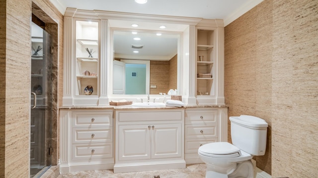 full bathroom featuring built in shelves, toilet, vanity, a shower stall, and crown molding