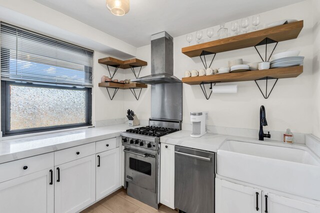 4705 Henry Hudson Pkwy W Unit 7G, Bronx, NY 10471 - kitchen featuring range hood, open shelves, appliances with stainless steel finishes, white cabinetry, and a sink