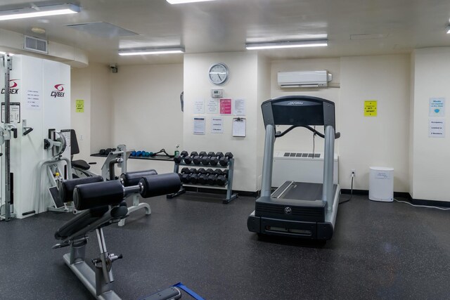 4705 Henry Hudson Pkwy W Unit 7G, Bronx, NY 10471 - exercise room with visible vents, baseboards, and a wall mounted AC