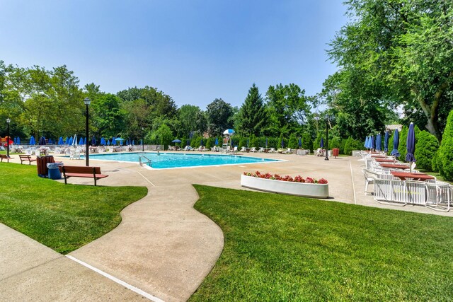 4705 Henry Hudson Pkwy W Unit 7G, Bronx, NY 10471 - pool with a patio, fence, and a lawn