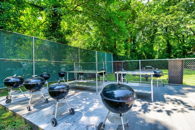 4705 Henry Hudson Pkwy W Unit 7G, Bronx, NY 10471 - view of property's community with an outdoor fire pit and fence