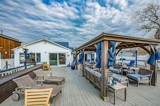 wooden terrace with fence and a gazebo