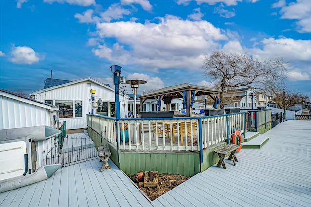 wooden deck with a gazebo