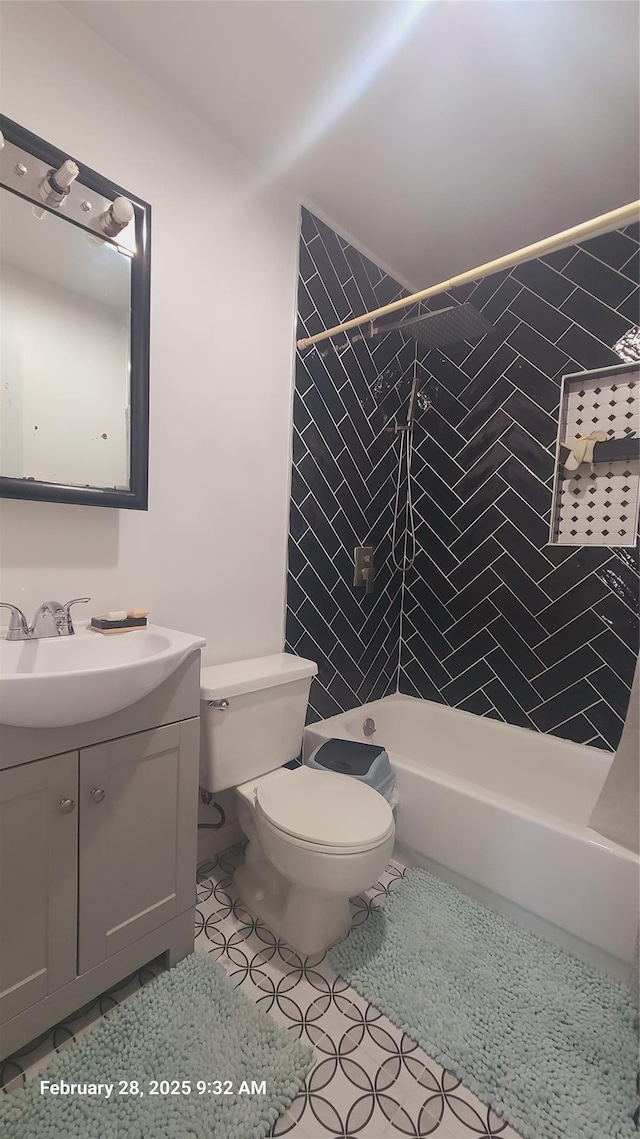 bathroom with washtub / shower combination, vanity, toilet, and tile patterned floors