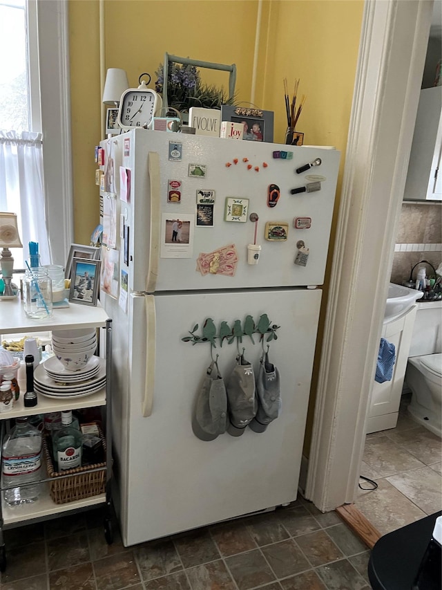 interior space with freestanding refrigerator