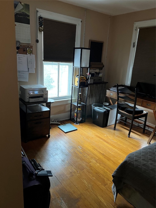 bedroom featuring hardwood / wood-style floors