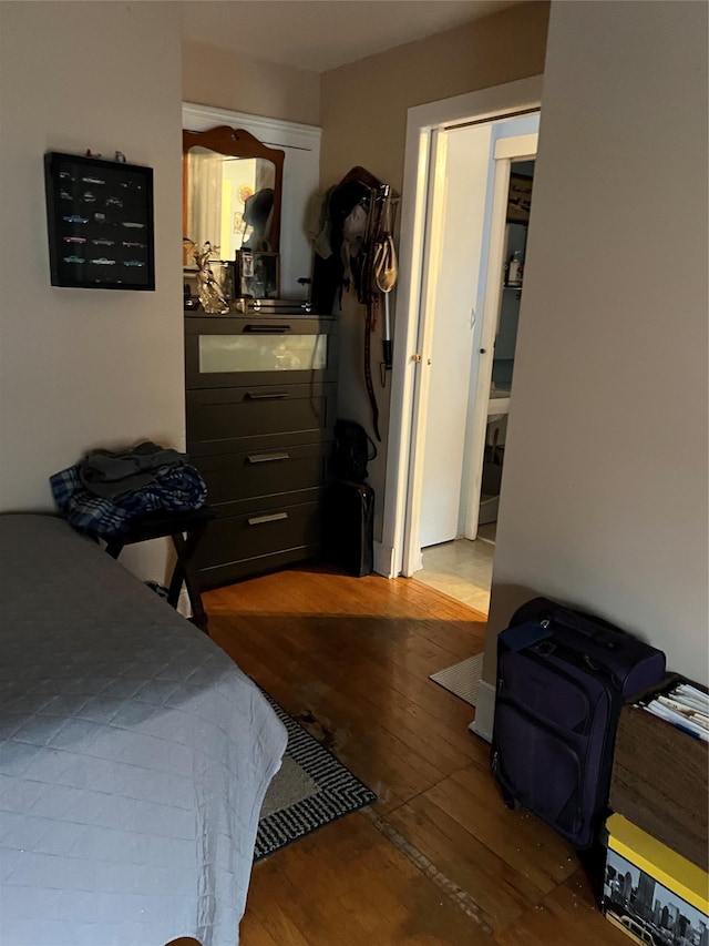 bedroom featuring wood-type flooring