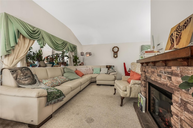 living area with lofted ceiling, a fireplace, and carpet flooring