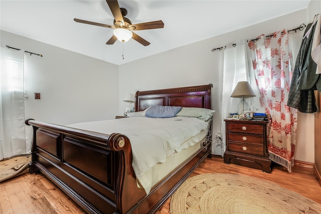 bedroom featuring ceiling fan and light wood finished floors