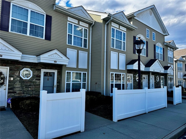 multi unit property with stone siding