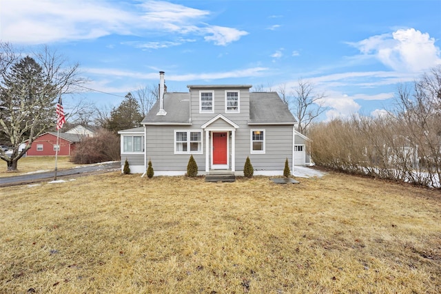 bungalow-style home with a garage and a front yard