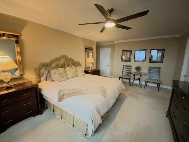 bedroom featuring ceiling fan, baseboards, crown molding, and light colored carpet