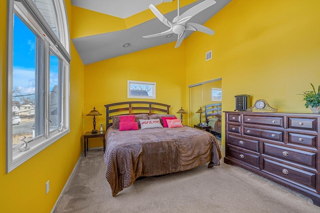 bedroom with ceiling fan, high vaulted ceiling, carpet, and visible vents