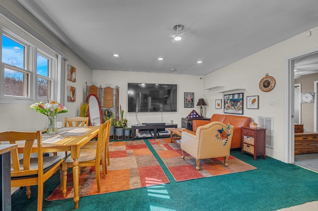 carpeted living room with recessed lighting and visible vents