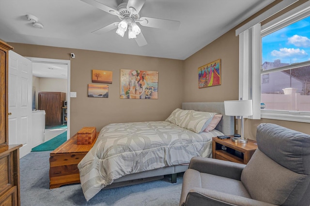 carpeted bedroom featuring a ceiling fan