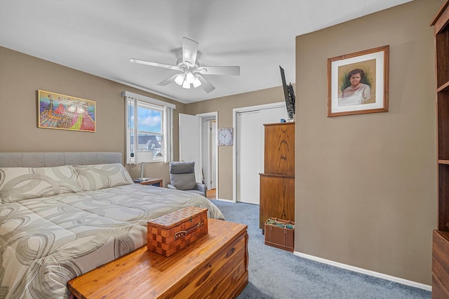 carpeted bedroom featuring a ceiling fan and baseboards