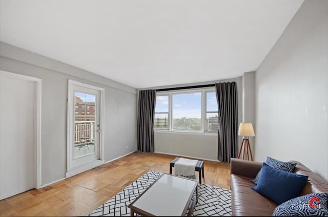 living room featuring baseboards