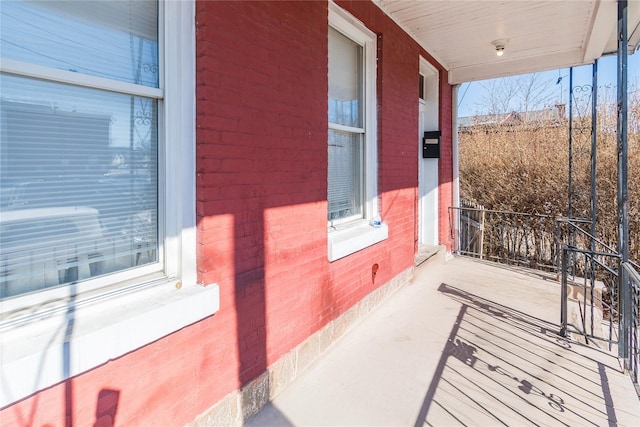 view of patio featuring a porch