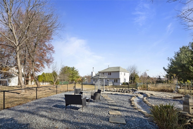 exterior space with fence and a patio