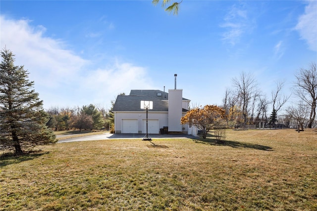 rear view of property with a yard