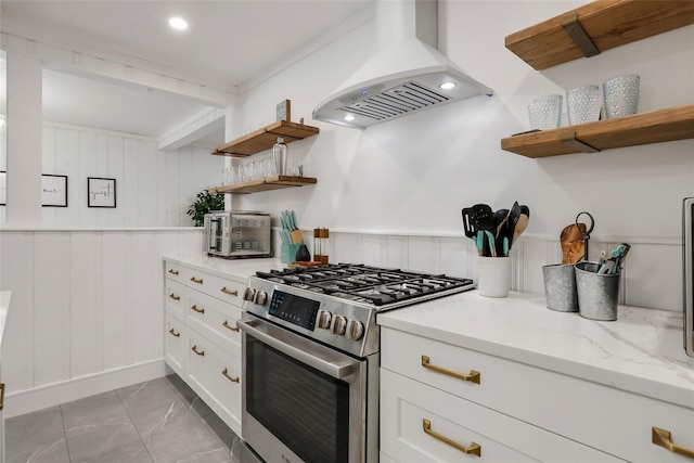 kitchen with white cabinets, marble finish floor, open shelves, stainless steel range with gas stovetop, and custom range hood