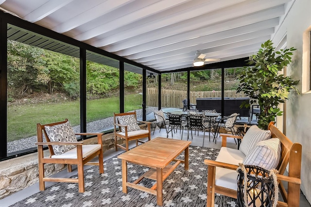 sunroom / solarium with beamed ceiling