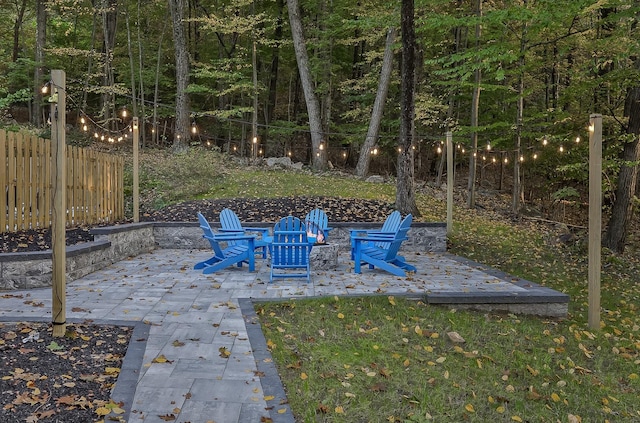 view of yard featuring fence and a patio