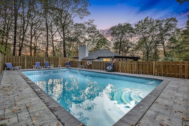 view of pool with a fenced backyard and a fenced in pool