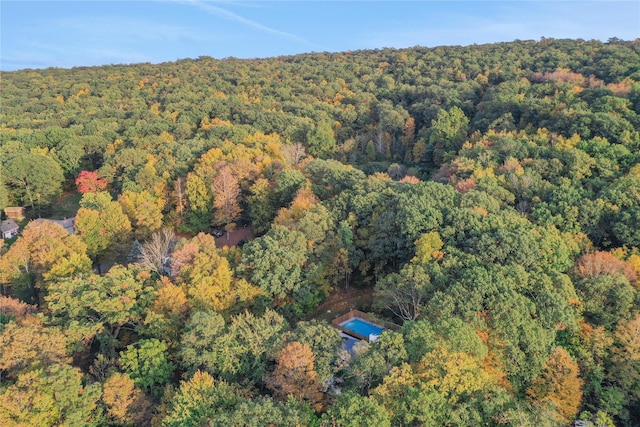 aerial view with a wooded view