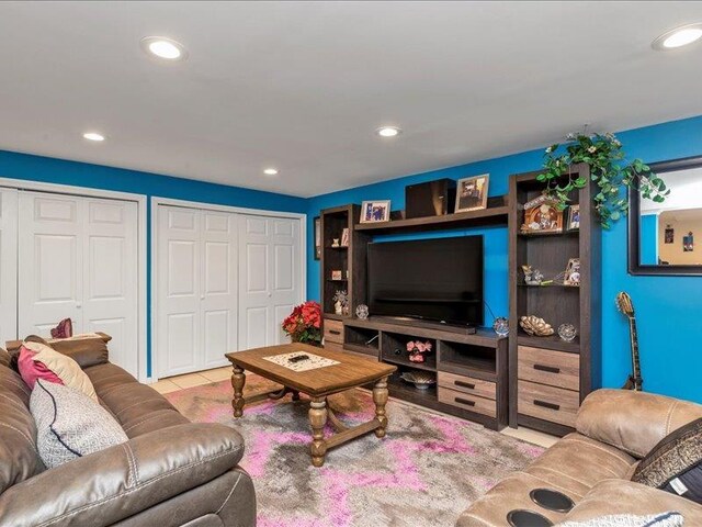 tiled living area with recessed lighting