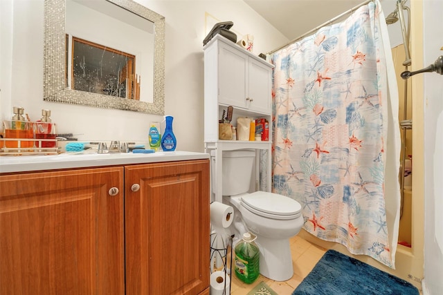 full bath featuring vanity and toilet