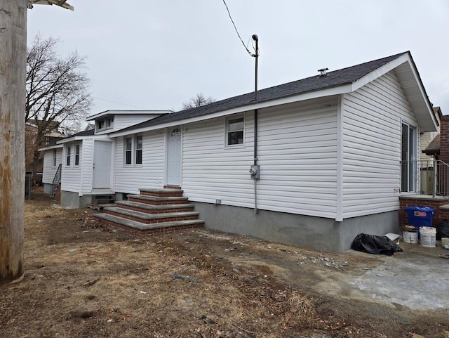 back of property with entry steps