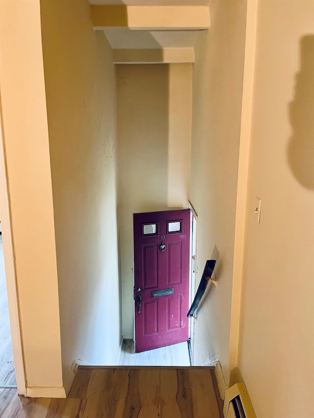 foyer with wood finished floors