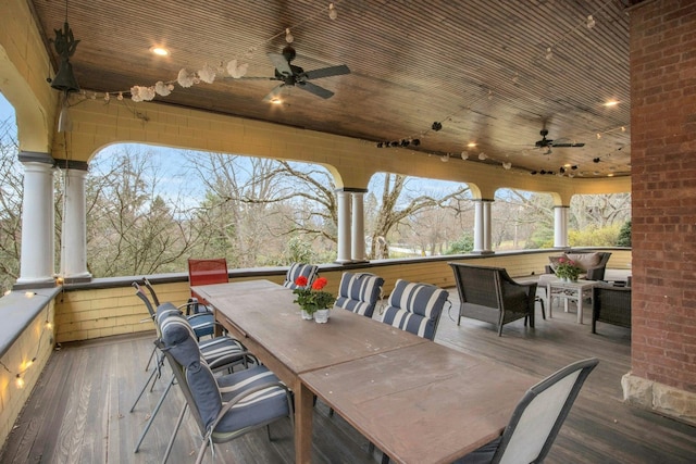 deck featuring outdoor dining space and ceiling fan